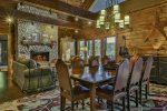 Open dining with wood-burning fireplace